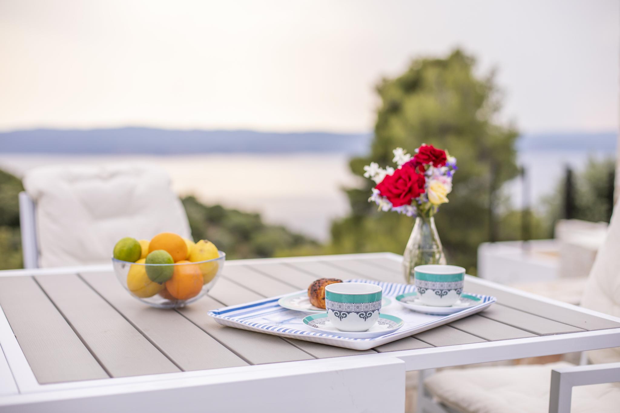 Private villa terrace in Skiathos overlooking the Aegean Sea, ideal for multi-generational family gatherings