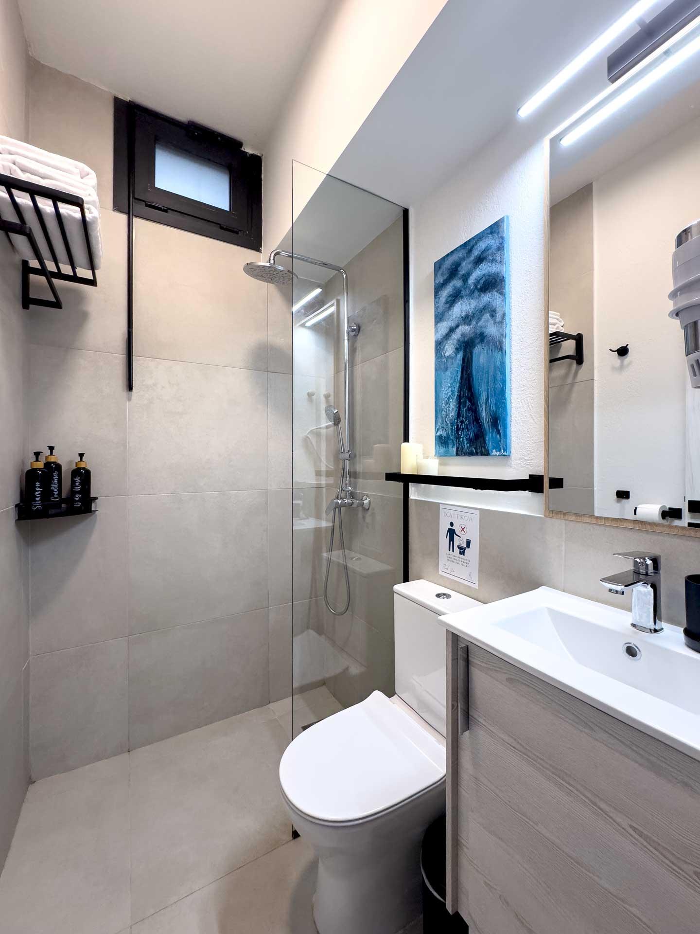 Luxury Skiathos villa bathroom for travellers arriving by flight to the Greek islands